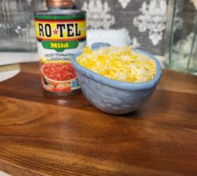 chicken casserole and rice, Rotel beside cup of shredded cheese