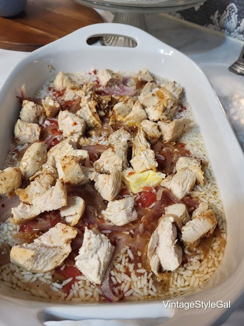 chicken casserole and rice, cooked chicken added to baking dish