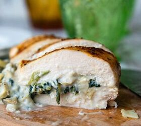 spinach artichoke stuffed chicken, close up of the inside of stuffed chicken breasts