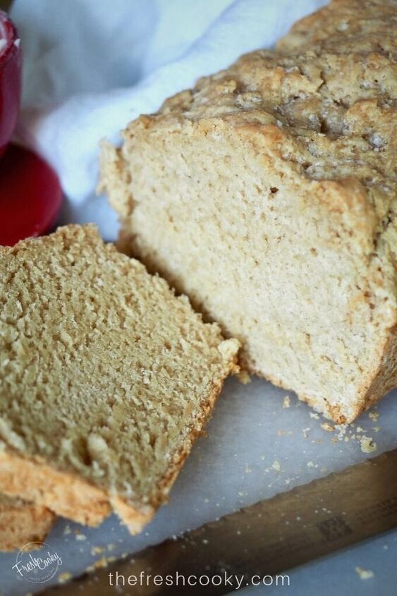 easy 4 ingredient beer bread, Close up image of sliced beer bread with loaf and a few slices