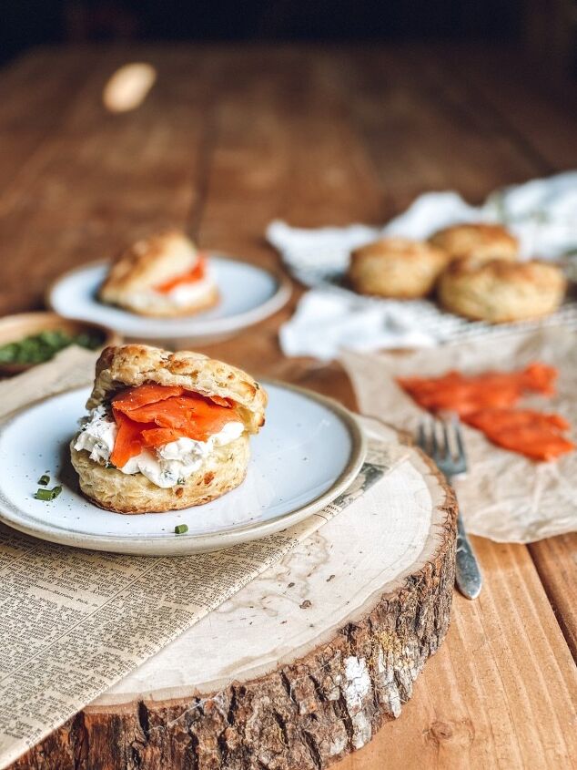 feta chive buttermilk biscuits with cream cheese and salmon, Feta chive buttermilk biscuit on a plate over newspaper