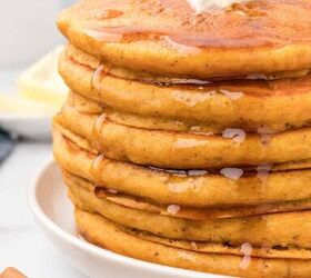 easy fluffy pumpkin pancakes with pancake mix, A stack of pumpkin pancakes with syrup drizzle