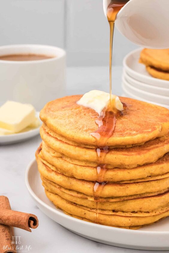 easy fluffy pumpkin pancakes with pancake mix, Drizzling syrup over the pancakes