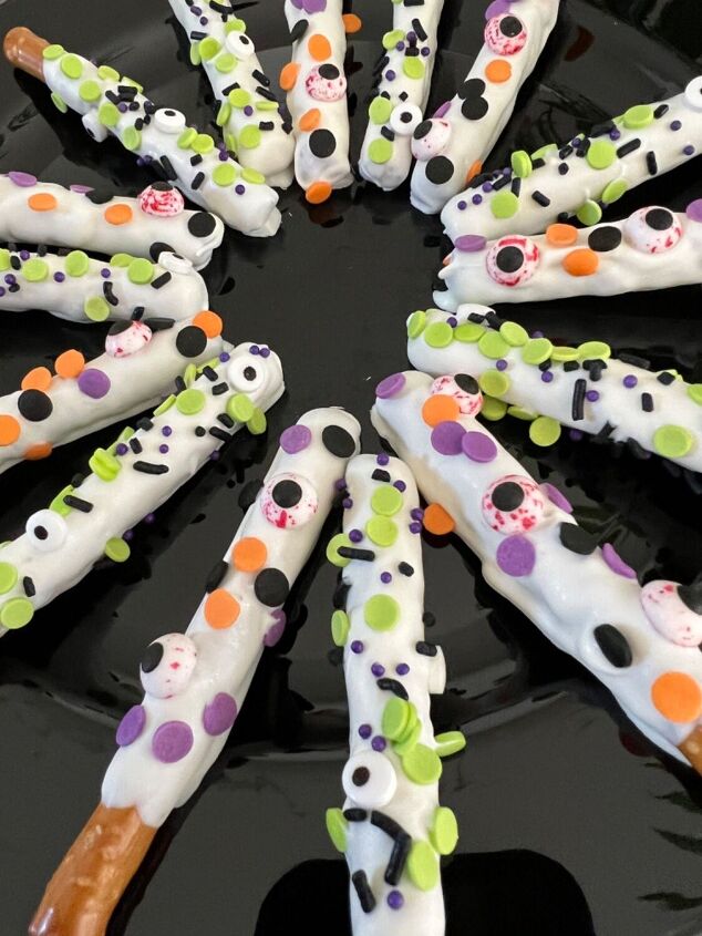 19 spooktacular halloween recipes to trick or treat yourself, Mini Candy Coated Pretzel Rods Jersey Girl Knows Best