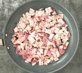warm potato salad recipe with bacon, A pile of chopped uncooked bacon in a large gray skillet