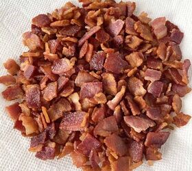 warm potato salad recipe with bacon, A pile of golden brown cooked chopped bacon draining on a white paper towel