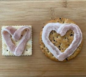 bacon heart appetizers, Bacon heart crackers on a bamboo cutting board
