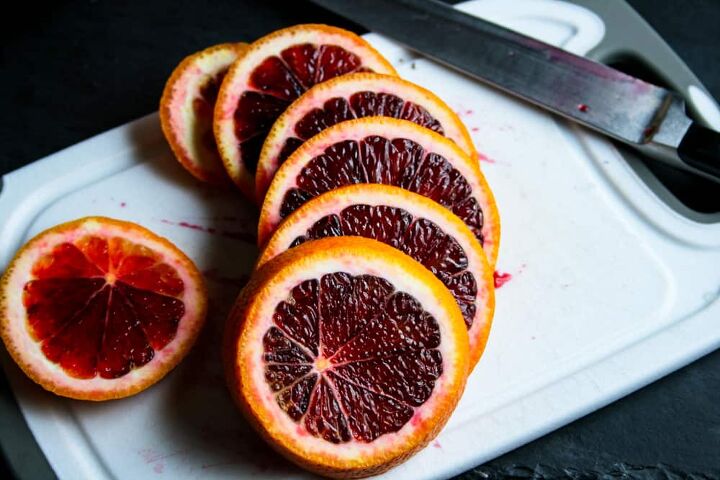 winter white sangria, Blood orange slices on a cutting board