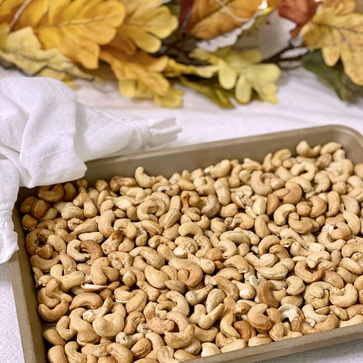 roasted rosemary cashews, Cashews on a cookie sheet after they ve been roasted in the oven