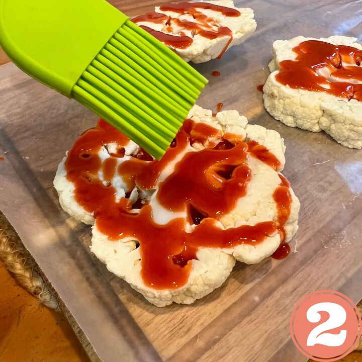 easy air fried cauliflower steaks with buffalo sauce, Brush your cauliflower steaks with hot sauce