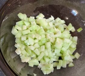 5 ingredient greek chicken pitas, Diced cucumber in a large bowl