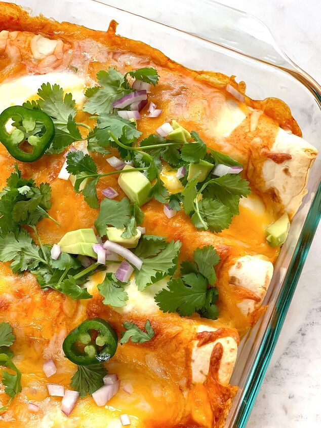 A baked pan of enchiladas from the blog post easy chicken enchilada recipe