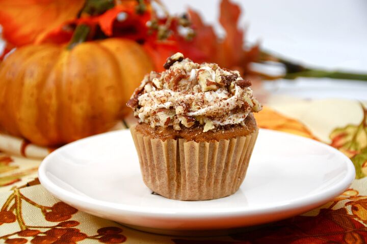 pumpkin pecan pie cupcakes recipe, Directly after frosting the cupcakes roll the frosted part of the cupcake in the chopped bits of crunchy pecans Top with an additional dollop of frosting in the center of the cupcake Set aside