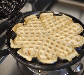 easy cast iron sourdough waffles, sourdough waffle in cast iron waffle maker on stove top
