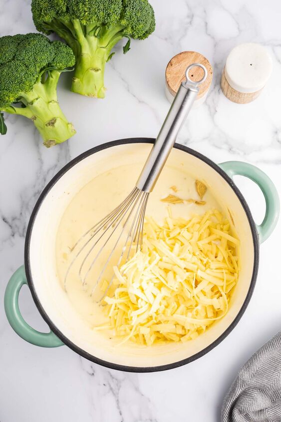 cheesy broccoli au gratin recipe, Cheesy and dijon mustard being added to the cheese sauce