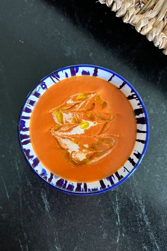 Homemade tomato soup with cream and olive oil