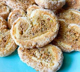 pistachio palmiers with cardamom, A close up of pistachio palmiers on a plate