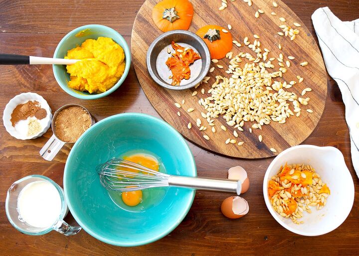 real food pumpkin pie, MIse en place of eggs in a large turquoise bowl pumpkin puree spices