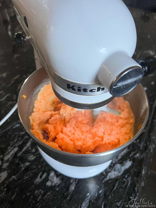 mashed sweet potatoes with bourbon praline sauce divinely delicious, Mixing sweet potatoes and butter in stand mixer