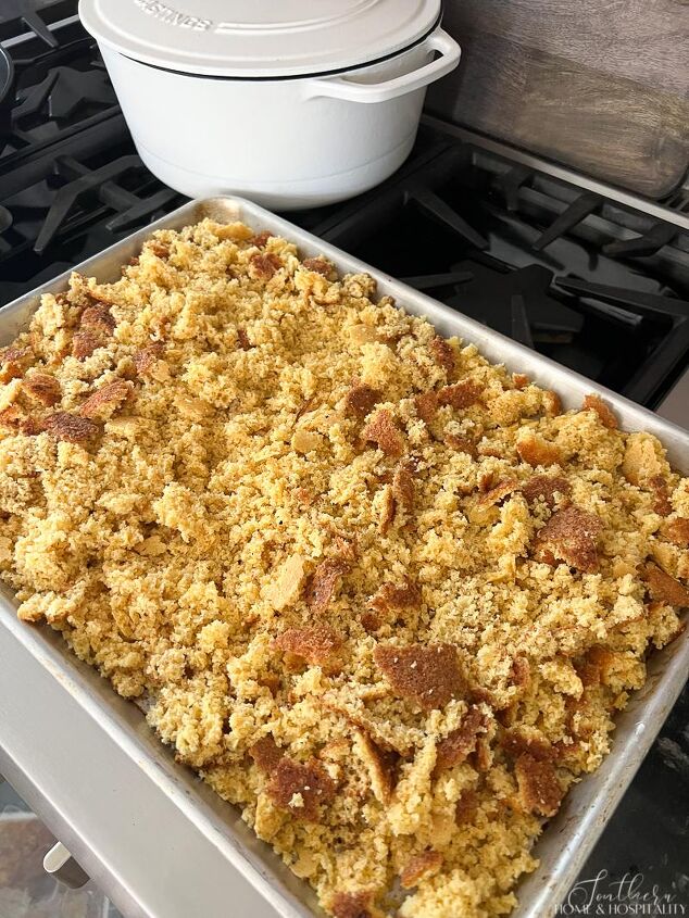 homemade southern cornbread dressing just like grandma s only easier, Crumbled cornbread on a baking sheet