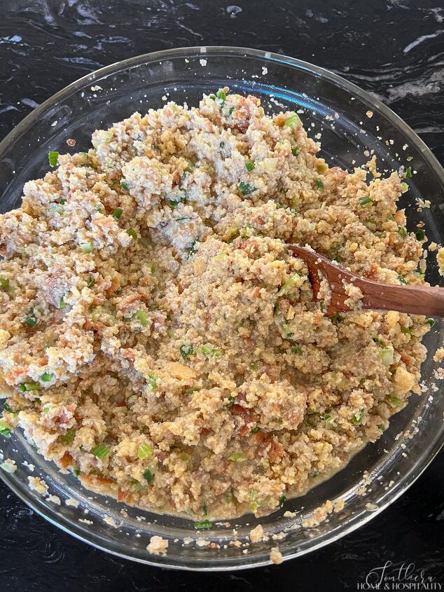 homemade southern cornbread dressing just like grandma s only easier, Mixing cornbread dressing batter in a bowl