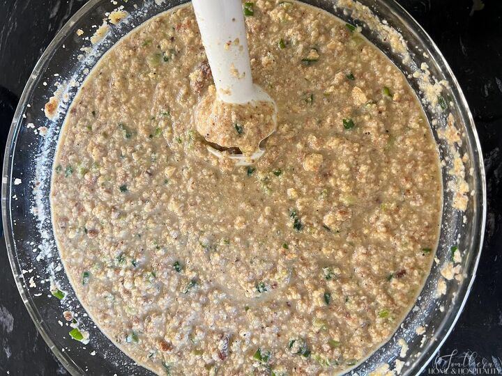 homemade southern cornbread dressing just like grandma s only easier, Mixing cornbread dressing with an immersion blender