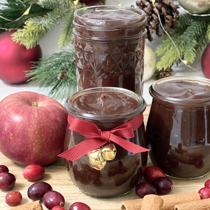 holiday cranberry apple butter, Holiday Cranberry Apple Butter in jars tied with a red bow and gold bells for decoration and gift giving
