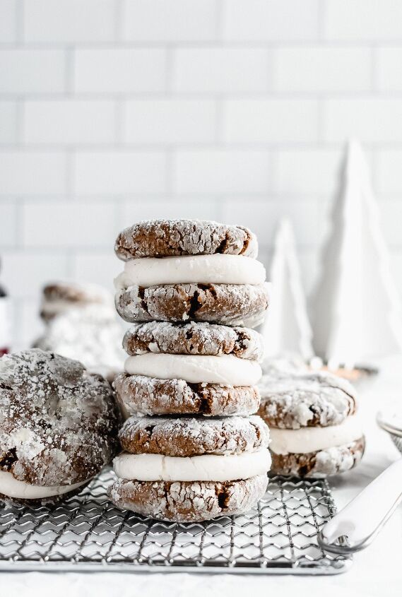 Gingerbread crinkle cookie sandwiches stacked on top of each other