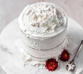 eggless red velvet cake with vanilla cream cheese frosting, red velvet cake with dairy free white chocolate on top