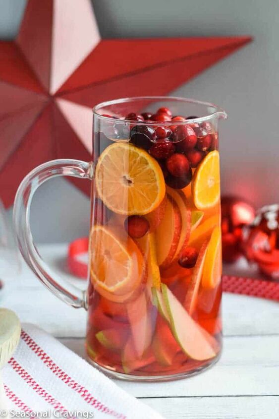 five ingredient white sangria, White Sangria in a pitcher with a red star in background