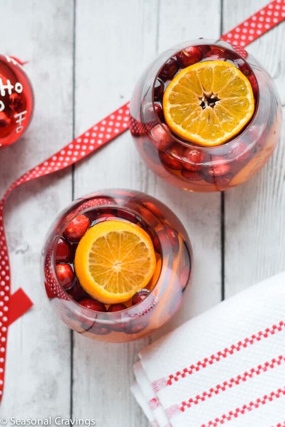 five ingredient white sangria, White Sangria in two glasses with a red ribbon