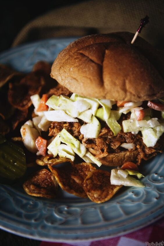 easy slow cooker pulled pork kita roberts girl carnivore, The pulled pork and coleslaw pouring out of this sandwich has me jealous of my former self for getting to eat it You re gonna want three napkins