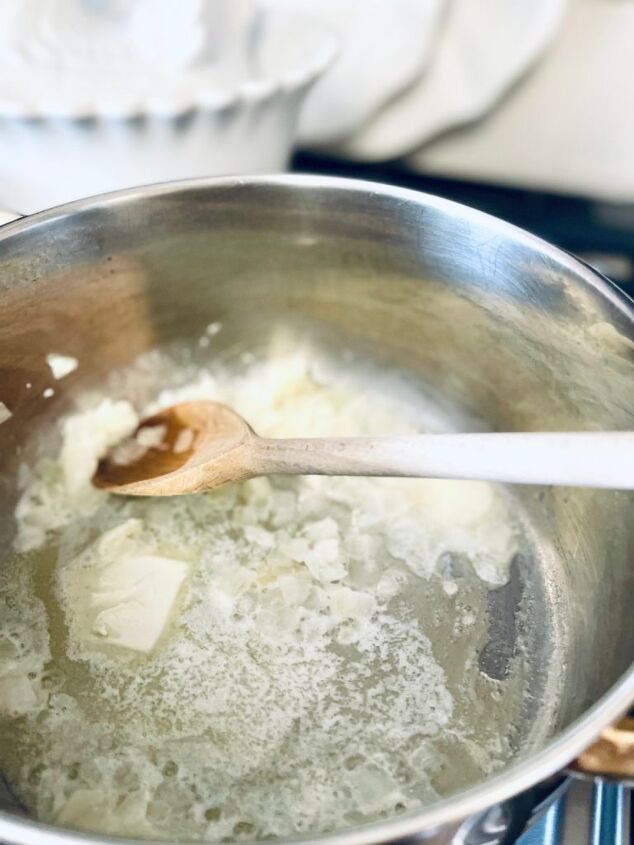 easy gluten free chicken pot pie, Adding onions to a stock pot