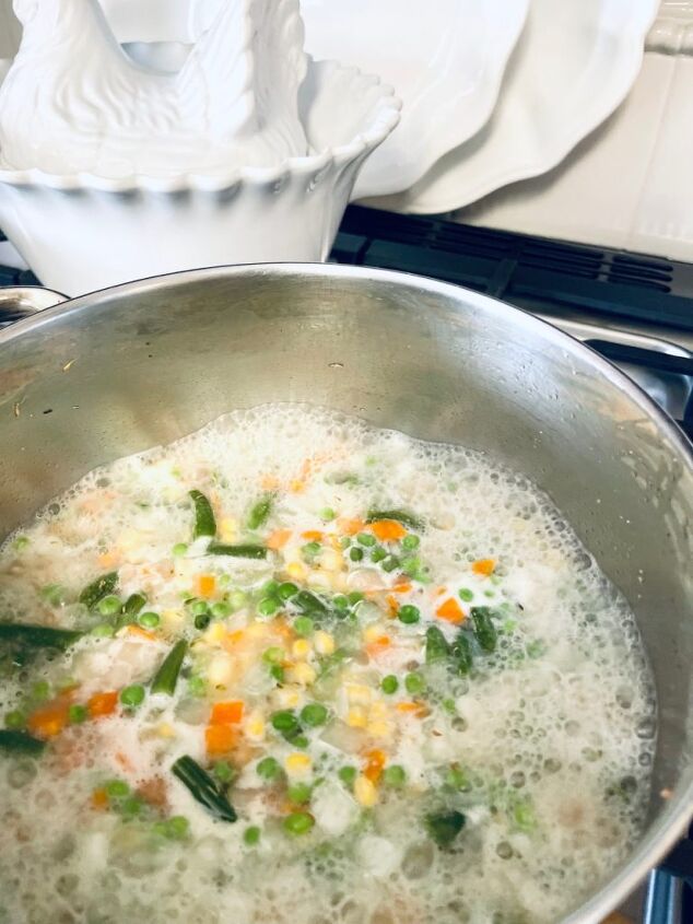 easy gluten free chicken pot pie, Vegetables and chicken mixture coming to a boil
