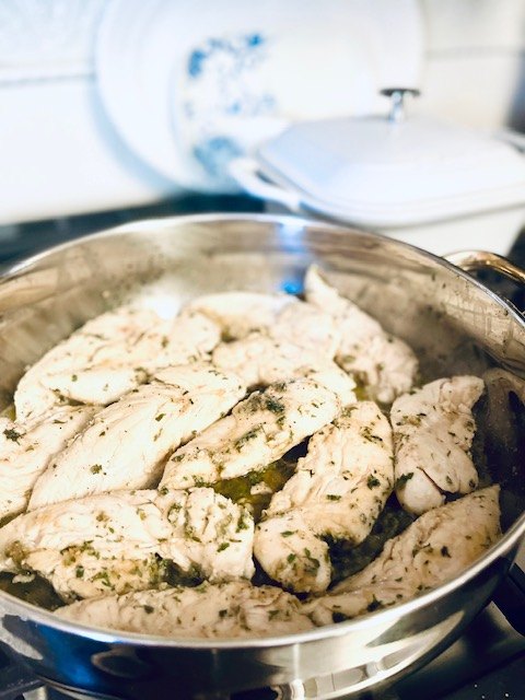 easy gluten free chicken tuscany, Seasoned chicken cooking in the pan