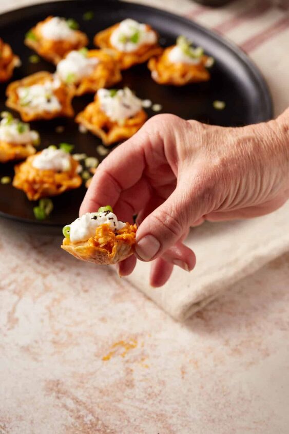 buffalo chicken bites, An individual chicken bite topped with sour cream