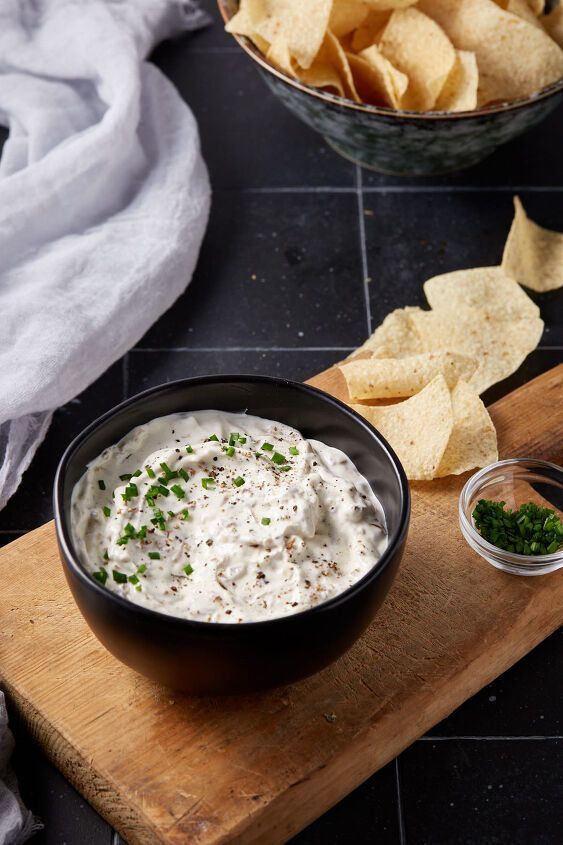 sour cream and onion dip, French onion dip in a bowl next to tortilla chips