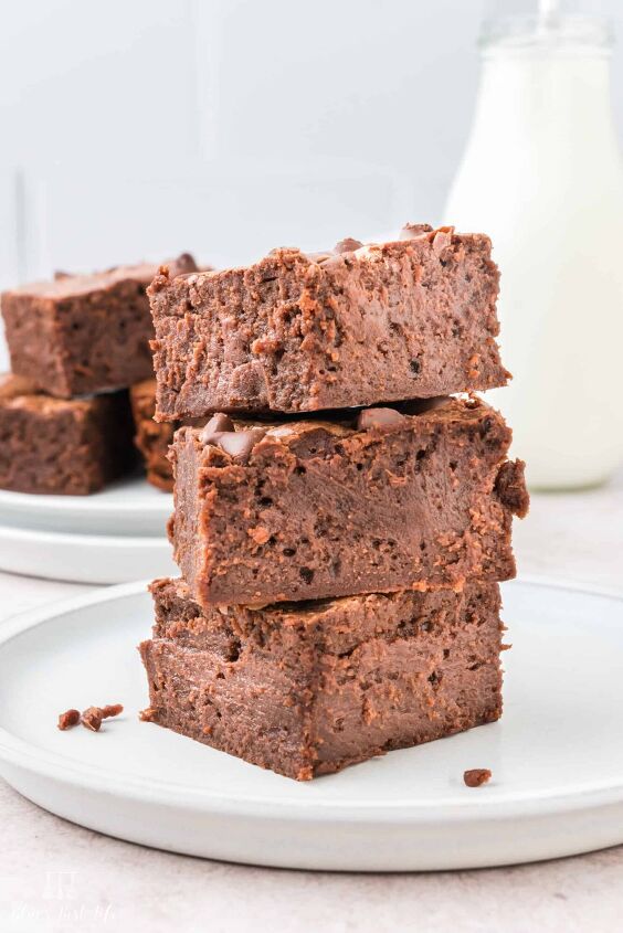 easy fudgy condensed milk brownies recipe, A stack of brownies on a plate