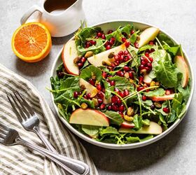 kale and apple salad with maple mustard dressing, kale salad with apples and dressing on the side