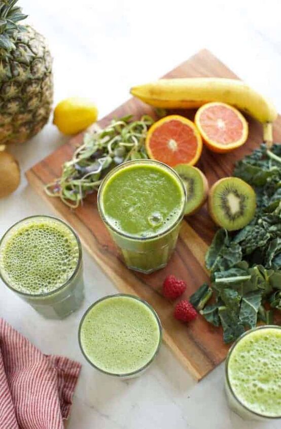 green smoothie recipes for beginners, four green smoothies in glasses