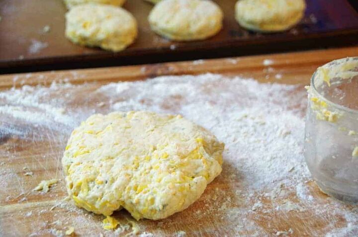 yellow squash cheddar cheese biscuit recipe, homemade biscuit dough on cutting board