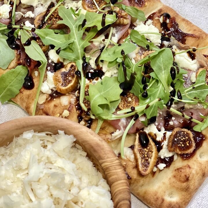 prosciutto and fig flatbread, Prosciutto and Fig Flatbread after baking with fresh arugula and Balsamic glaze drizzled on top