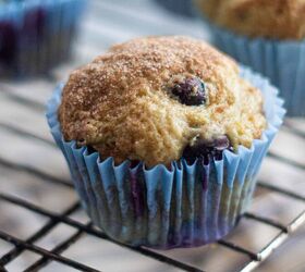 soft and fluffy vegan blueberry muffins, A single blueberry muffin on a cooling tray