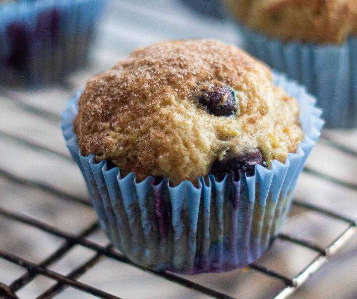 soft and fluffy vegan blueberry muffins, A single blueberry muffin on a cooling tray