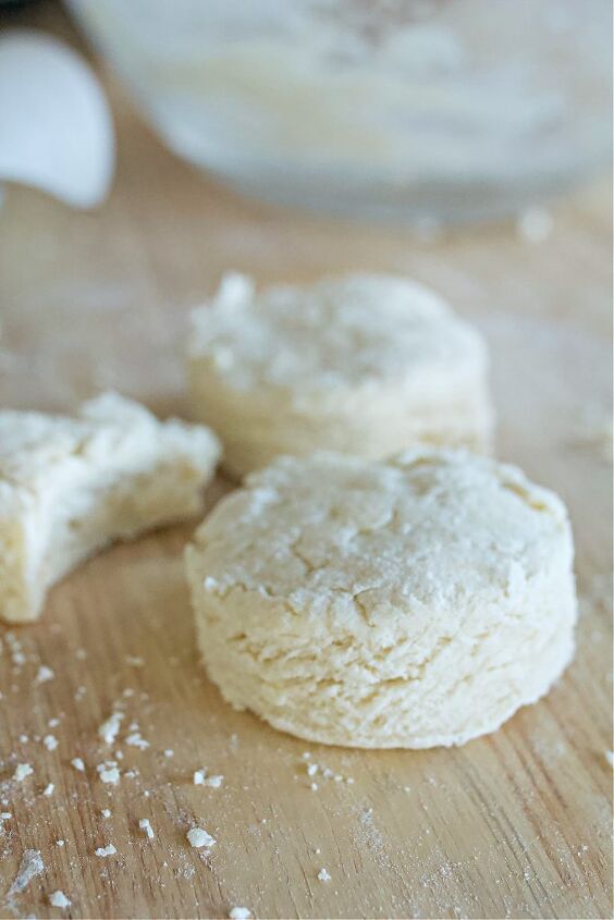 easy and quick biscuit recipe, biscuit dough cut into round on counter