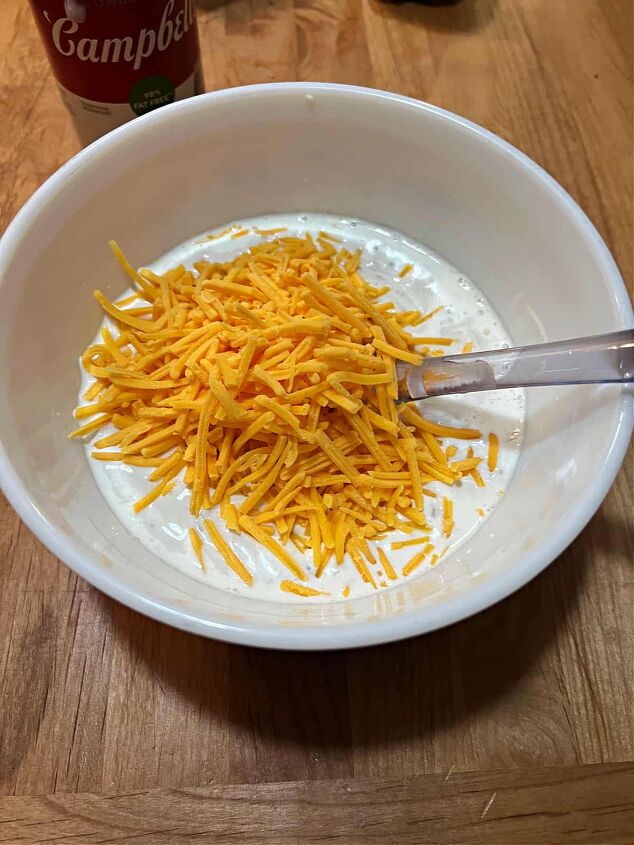 hamburger and potato casserole, Mix soup milk and cheese