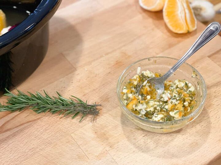 slow cooker orange chicken, chopped rosemary butter and orange marmalade for rub