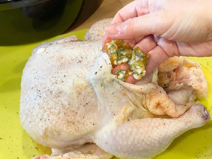 slow cooker orange chicken, placing infused butter under skin of whole chicken