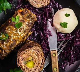 rouladen german beef roll ups instant pot and slow cooker, A close up shot of rouladen on a plate with rotkohl and a fork and knife