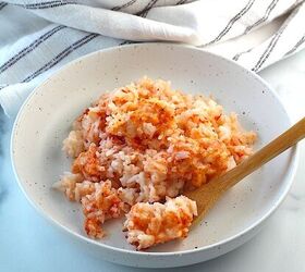 brazilian baked rice with cheese and tomatoes, Spoon in bowl of Baked Rice with Cheese and Tomatoes